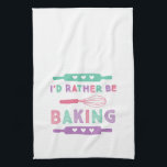 I'd Rather be Baking Pink Purple Geschirrtuch<br><div class="desc">A cute kitchen towel for the baker in your life with "I'd rather be baking" in a fun retro font with illustrations of rolling pins and a whisk in pink,  purple and teal.</div>