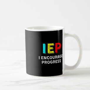 IEP I ermutigt zur Förderung von Fortschritten in  Kaffeetasse