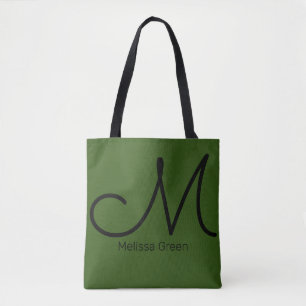 ihre grüne Tasche mit Namen und Anfangsbuchstaben
