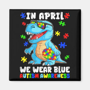 Im April tragen blaue T-Rex Autismus-Bewusstseinst Magnet