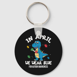 Im April tragen wir blauen Dinosaurier Autismus-Be Schlüsselanhänger