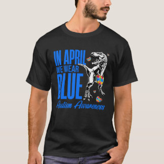 Im April tragen wir blaues Puzzle Rex Dinosaurier T-Shirt