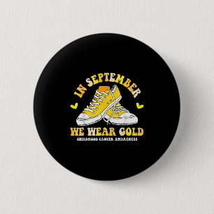 Im September tragen wir goldene Sneaker-Kinderkreb Button