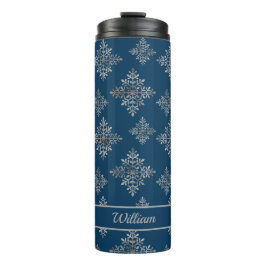 Imitate graue Schneeflocken auf blau (nicht echter Thermosbecher