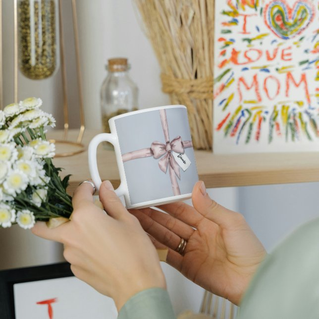 In einem rosa Bogen gefangen Kaffeetasse (Von Creator hochgeladen)
