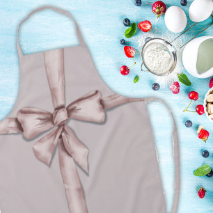 In einem rosa Bogen gefangen Schürze