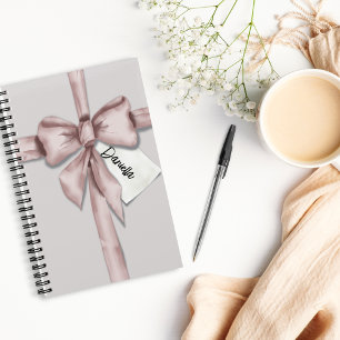 In einem rosa Bugheft verpackt Notizbuch