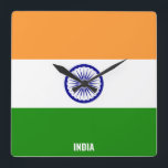 India Flag Dazzling Patriotic Square Quadratische Wanduhr<br><div class="desc">India Flag Dazzling Patriotic Square Wall Clock in the colors and the elements of the India national flag covering the front of the clock. National flag colors are complemented with the text "India" on the bottom. Text is fully customizable using "Customize it!" feature. Feel free to change it, remove it...</div>