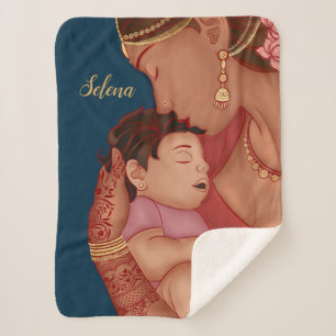 Indische Mutter, die ihr Baby mit Henna hält Sherpadecke