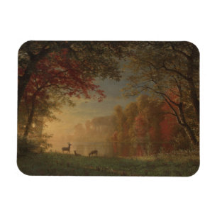 Indische Sonnenuntergang-Rotwild durch einen See Magnet