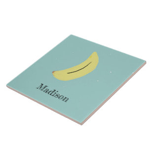 Individuelle Name bemalte Banane auf blau Fliese