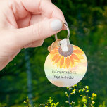 Individuelle Name Yoga Instructor Sonnenblume Schlüsselanhänger<br><div class="desc">Dieser moderne botanische Yoga Instructor Schlüsselanhänger ist mit einer gelben Sonnenblume auf einem Aquarell dekoriert. Einfach anpassbar. Ändern Sie mithilfe des Entwurfstools die Textgröße,  den Stil oder die Farbe. Wenn wir unsere Kunstwerke erstellen,  werden Sie dieses exakte Bild von anderen Designern nicht finden. Original Wasserfarbe © Michele Davies.</div>