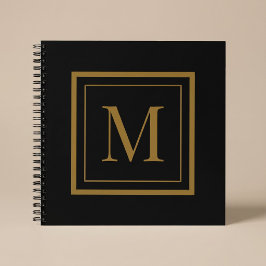Individuelles Monogramm mit schwarzem und goldenem Notizbuch