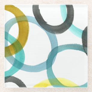 Ineinander greifen der gelben u. blauen Kreise Glasuntersetzer