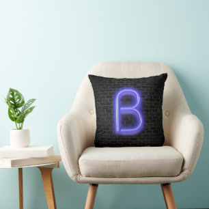 Initial B in Neon Lighting on Brick Kissen