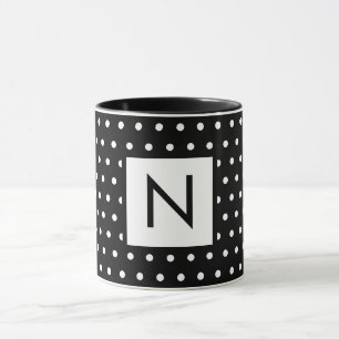 Initialbuchstabe der weißen schwarzen Polka-Punkte Tasse