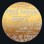 International Christmas Navidad Grueting R Sticker<br><div class="desc">Weihnachten in vielen Sprachen : Feliz Navidad - Feliz Natal - Joyeux Weihnachten - Fröhliche Weihnachten - Vrolijk Kerstfeest - Buone Feste Natalizie - Jul - Frohe Weihnachten, mit diesem schönen typografischen Design wie Ausschneiden und Papercut-Stil (weiße Schrift) auf goldenem Hintergrund. Design auf Rundaufkleber.. Sie können die Größe des Designs...</div>