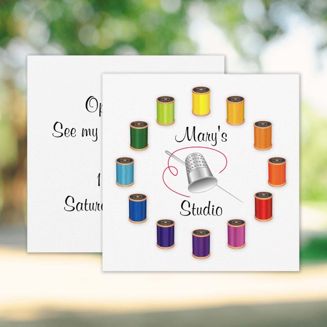 Invitation à votre Studio !  (Invitation to your Studio!
Silver thimble, needle and vivid color wheel of threads design. )