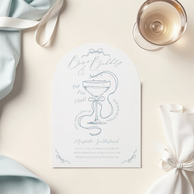 Invitation Bows dessinés Bubbly Cocktail Fête des mariées Arc (flatlay of an elegnat classy light pale cream beige surface with a blank white 5x7 invitation, shinn)