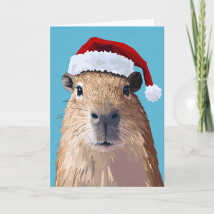 Invitation Capybara de fête avec un chapeau de Père Noël