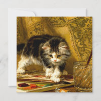 Kitten avec peinture et brosses