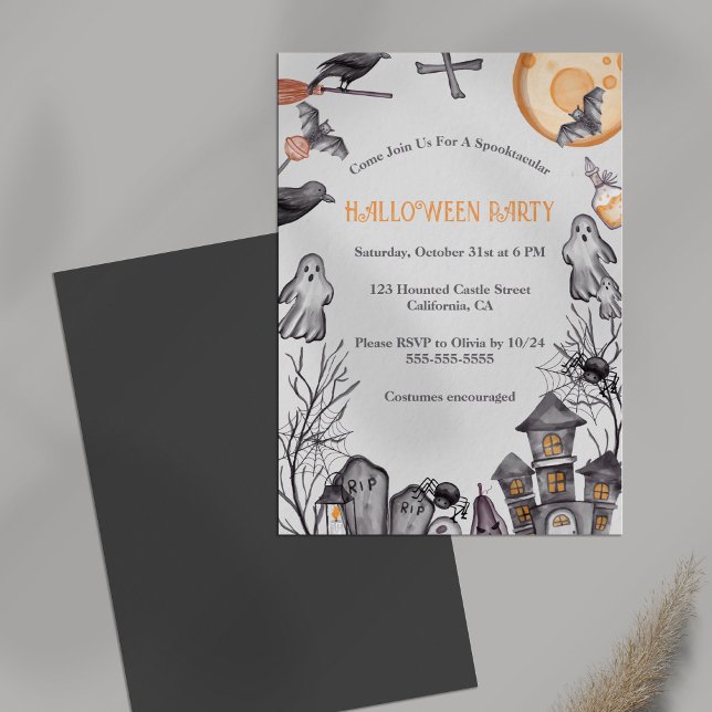 Invitation Soirée costumée d'Halloween pour enfants (Kids Halloween Costume Party Invitation on a table.)