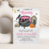 Un bébé brasse un Baby shower d'Halloween rose