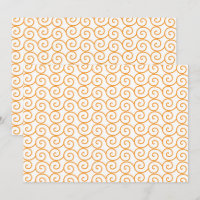 Un tapis marron et orange avec un motif répétitif