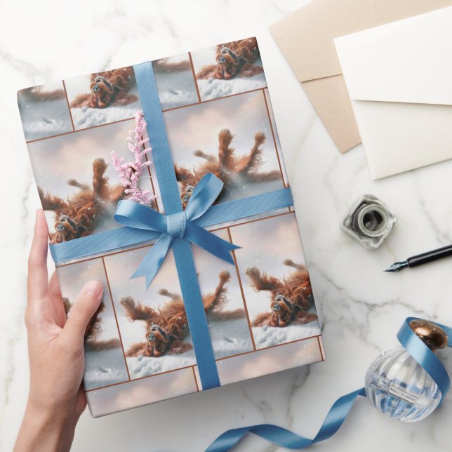 Irischer Setter hat Spaß im Schnee Geschenkpapier (Schenken)