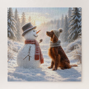 Irish Setter mit einem Schneemann
