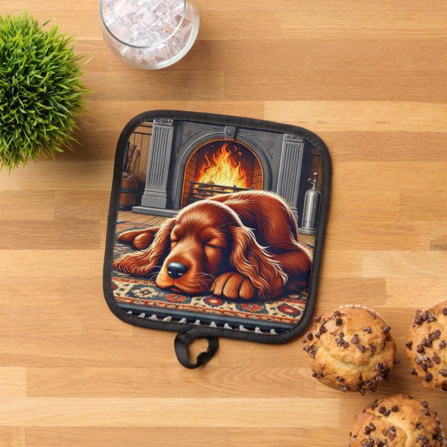 Irish Setter Welpe Schlafen durch einen warmen Kam Topflappen (Oben Unten)