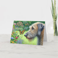 Irish Wolfhound mit Schmetterlingen