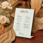 Ivory Minimalist Boho Wedding Menu Sockelschild<br><div class="desc">Elevate your reception table setting with this elegant Ivory Minimalist Boho Script Wedding Menu Pedestal Sign. Designed for self-standing display, this sturdy sign serves as a highly visible, two-in-one guide and decorative centerpiece. The clean, Ivory background and warm Coffee Romance typography create a sophisticated, boho chic aesthetic, complementing any wedding...</div>