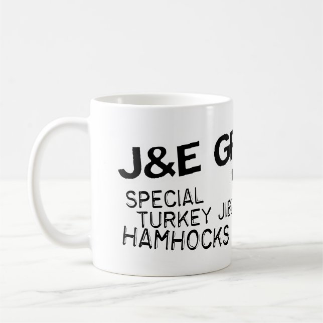 J- u. e-Lebensmittelgeschäft-Tasse Kaffeetasse (Links)