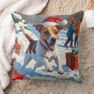 Jack Russell läuft im Schnee mit Weihnachtsmütze Kissen