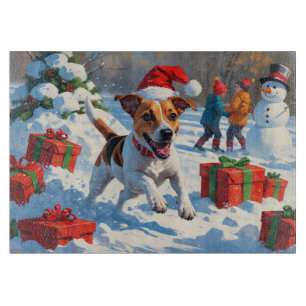 Jack Russell läuft in Snow mit Weihnachtsmütze Schneidebrett