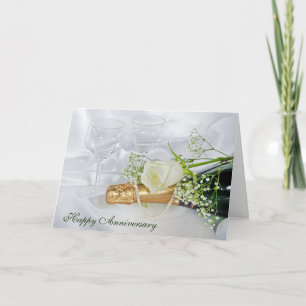 Jahrestag Champagnerflasche und Rose Karte