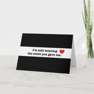 Je porte toujours une carte de sourire