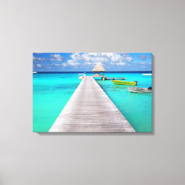 Jetty mit Booten in einer tropischen Lagune Leinwanddruck