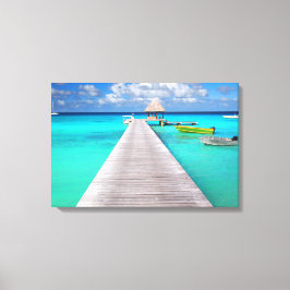 Jetty mit Booten in einer tropischen Lagune Leinwanddruck