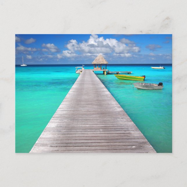 Jetty mit Booten in einer tropischen Lagune Postkarte (Vorderseite)
