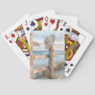 Jeu De Cartes Chapeau de soleil sur une clôture de plage