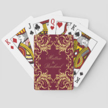 Damassé d'or de monogramme sur rouge foncé