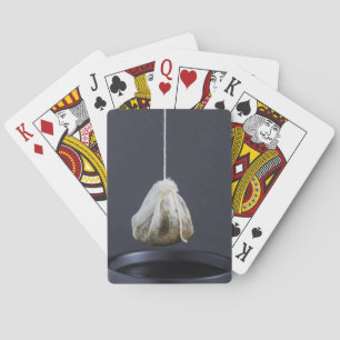 Jeu De Cartes Le sachet de thé est suspendu dans une tasse