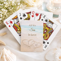 Plage de mariage coeurs sable monogrammé