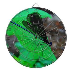 Jeu De Fléchettes Blue Damselfly on a green leaf.