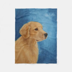 Jeune couverture d'ouatine de golden retriever