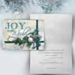 Jeweled Teal and Silver Christmas Card Feiertagskarte<br><div class="desc">Richly layered design in deep teal and silver featuring satin ribbons,  beads,  a silver filigree star,  diamond key,  silver ornament and holly. Text is embossed with a touch of glitter. Background is textured and distressed with twinkle highlights. Inside text is customizable. Matching products available.</div>