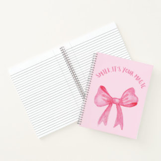 Joli cahier spirale rose avec un nœud