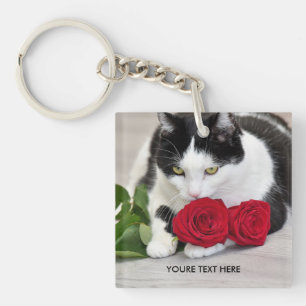 Joli chat avec la rose rouge